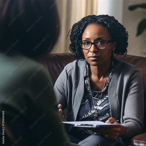African American therapist working with client
