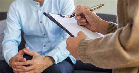 Therapist conducting a clinical interview