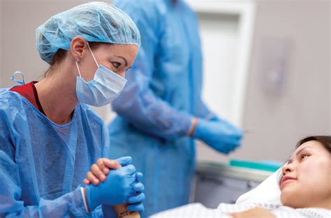 CNM nurse in delivery room