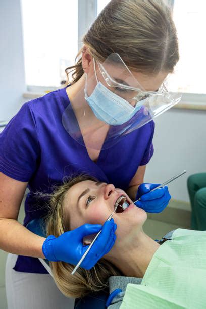 Dental office manager working on computer