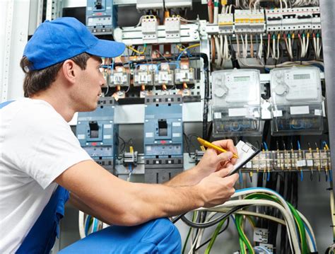 Electrician searching for jobs on a computer
