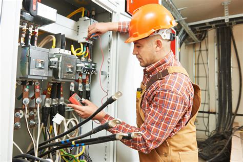 Electrician working on a computer