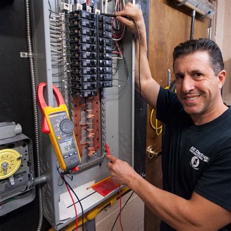 Electrician working on a circuit board