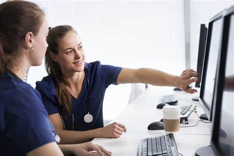 Informatics nurse working on a computer