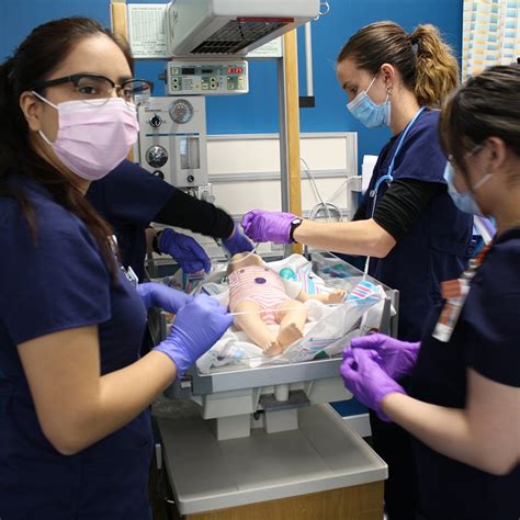NICU nurse educating parents