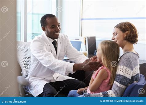 Pediatrician Examining Child