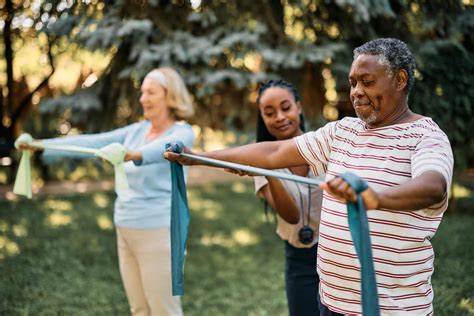 Seniors exercising with friends