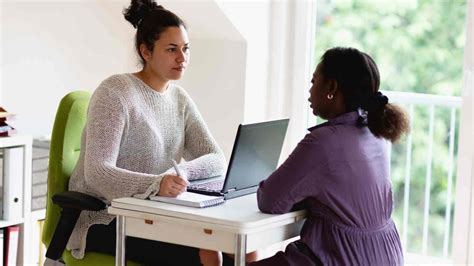 Social worker working with a client