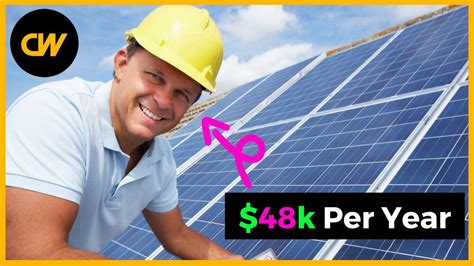 Solar panel installer at work