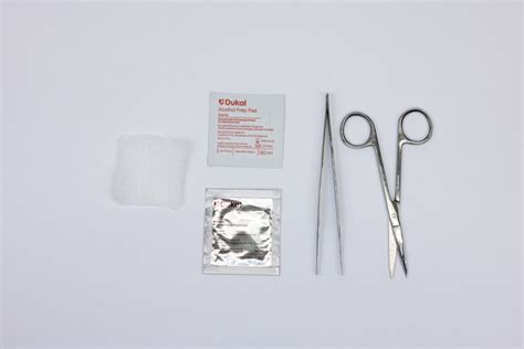 Suture Removal Tool with Magnifying Glass